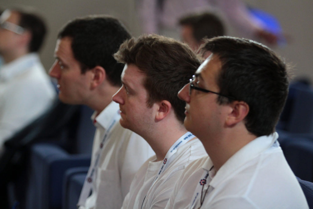 Thales listen to talks in the main hall