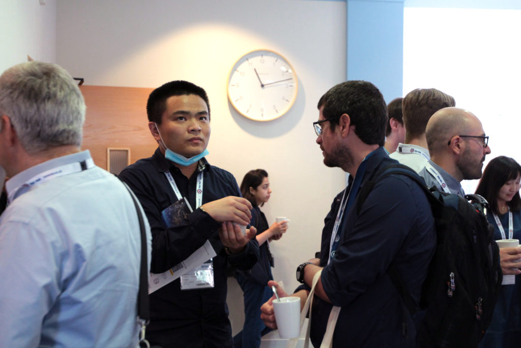 Delegates in discussion during the coffee break