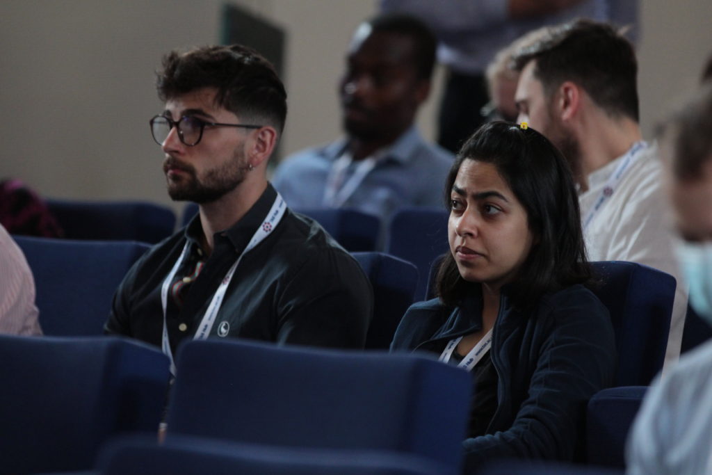 Delegates listening to talks in the main hall