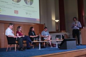 Research Programme Panel on stage in the Great Hall