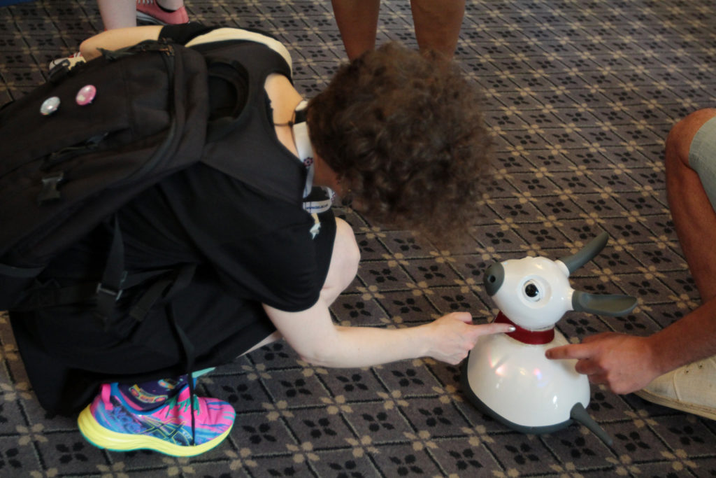 Delegate interacts with the Cobot Maker Space Demo