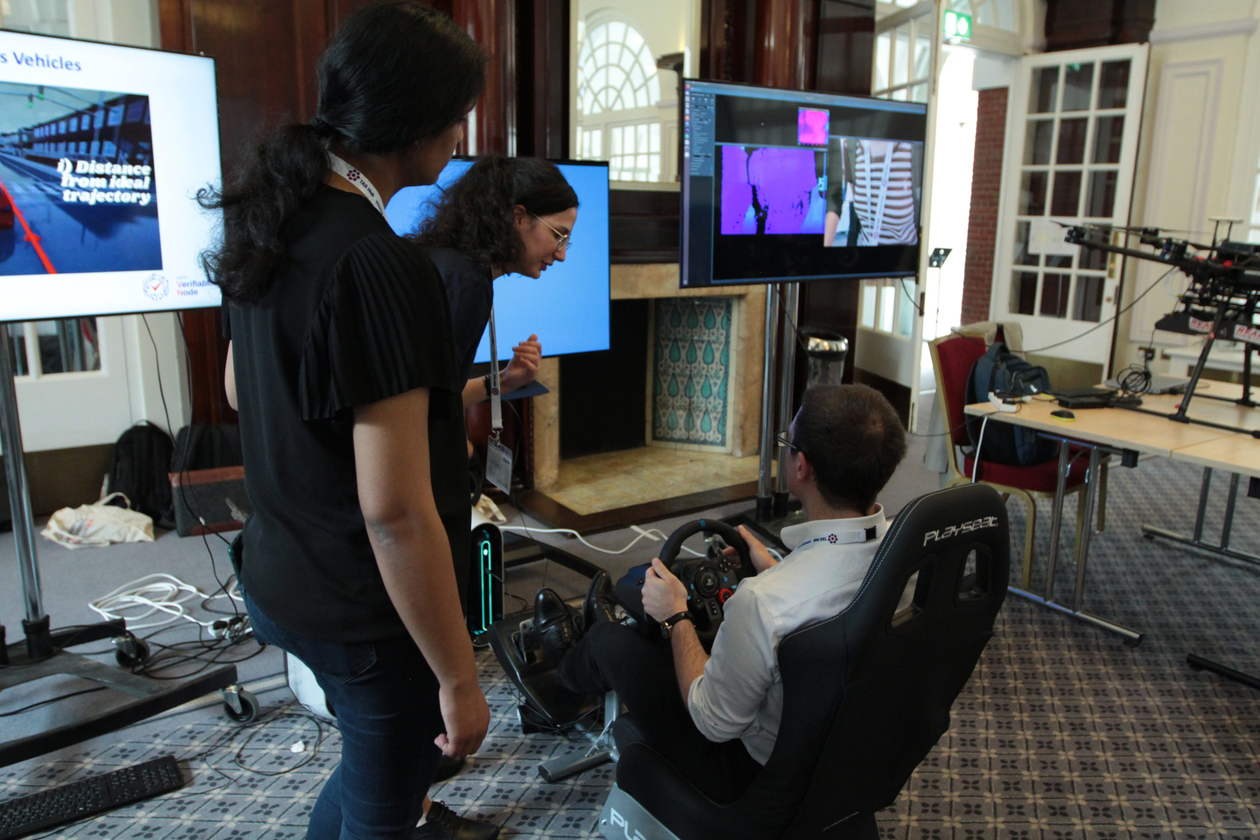 A delegate using the driving simulator