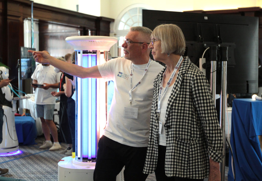 Prof Steve Benford and Prof Sharon Strover talking at the Cobot Maker Space demo