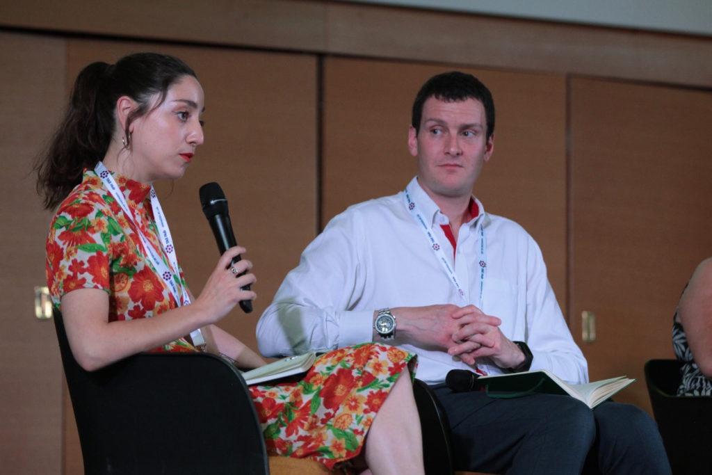 Ben Pritchard listens to Miranda Marcus